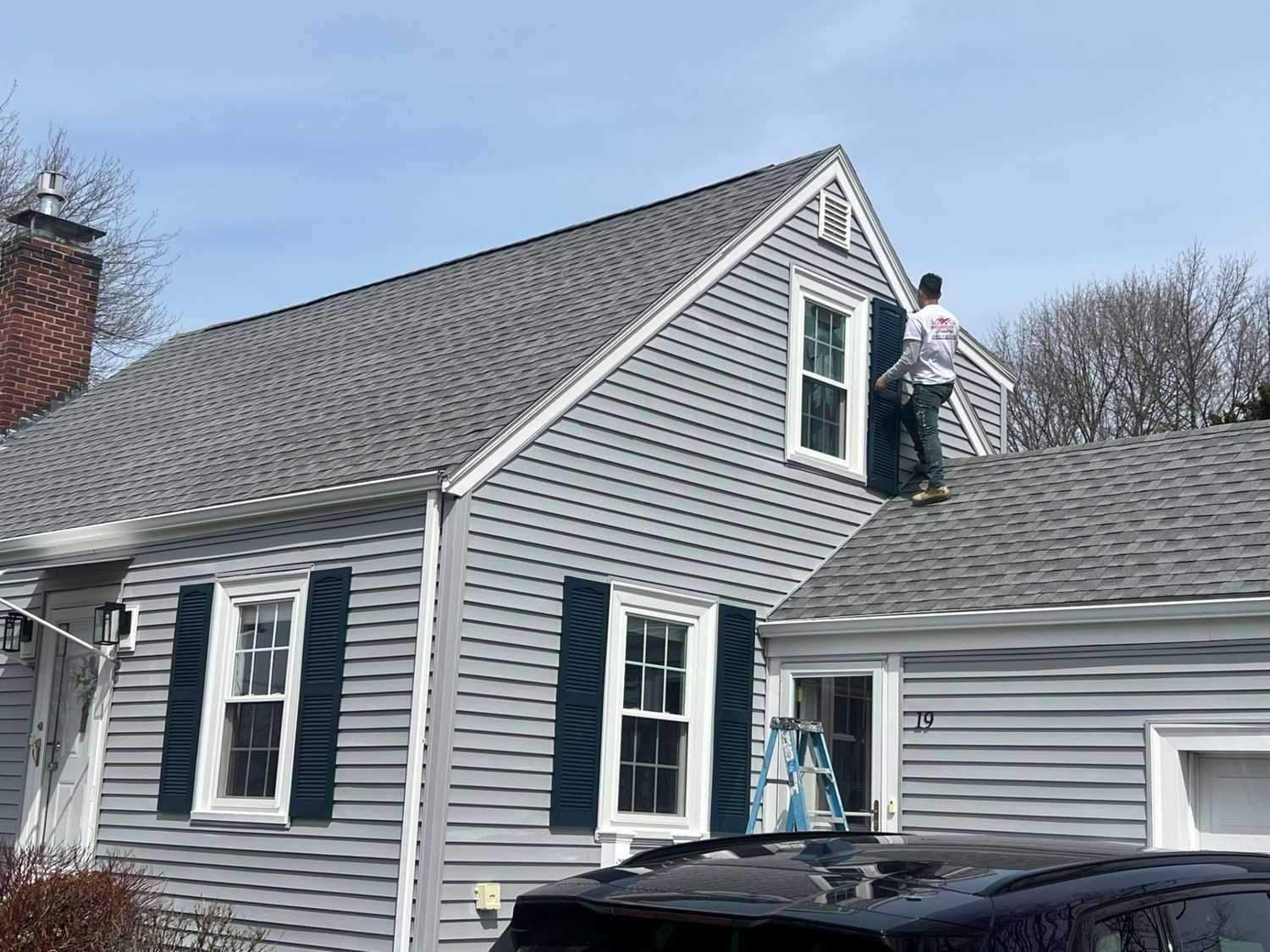 House painters in Lynn, MA painting a residential exterior