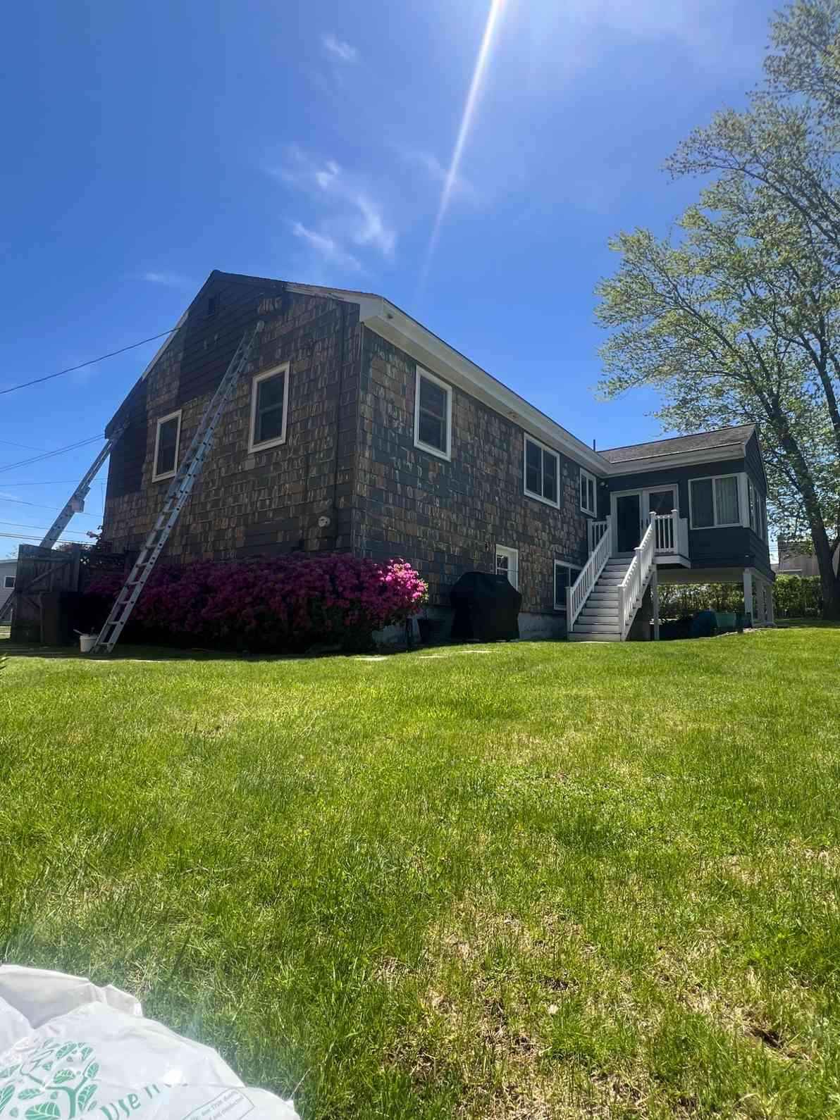 Home exterior preparation before painting in Peabody, MA