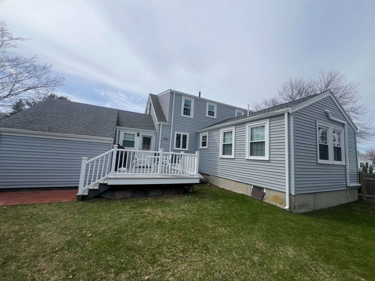 Exterior home painting backyard view in Lynn, MA