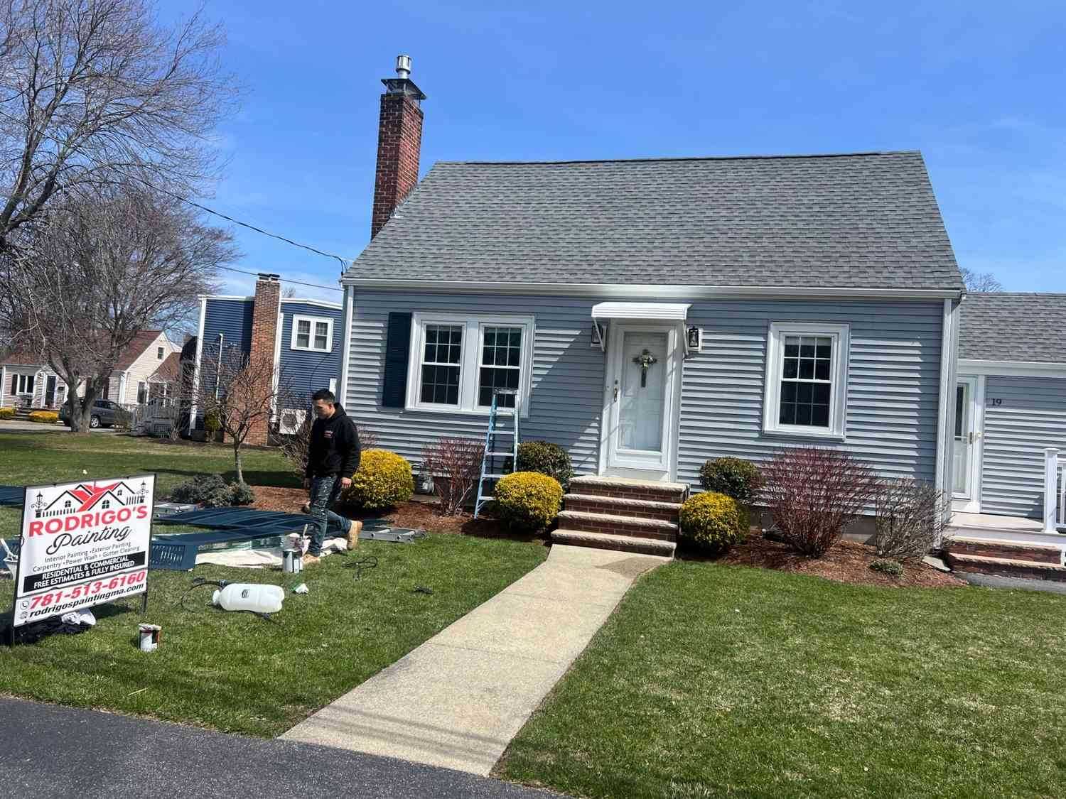 Residential house painters working on a home in Lynn, MA
